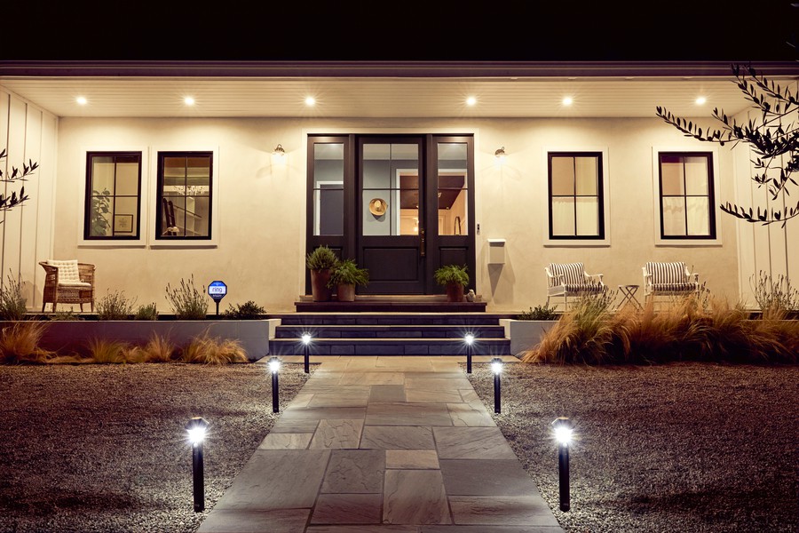 A home’s walkway illuminated by Ring exterior pathway lights.